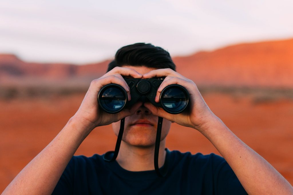 Image of man with binoculars with red desert in the background. On the 25th of November Amanda Rishworth, Shadow Minister for Youth, called for a Youth Recovery Strategy. Here’s one we prepared earlier.